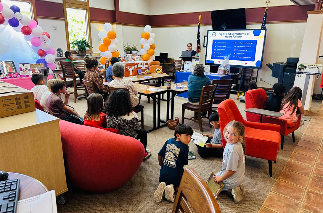 Community health workshop with families and presentation