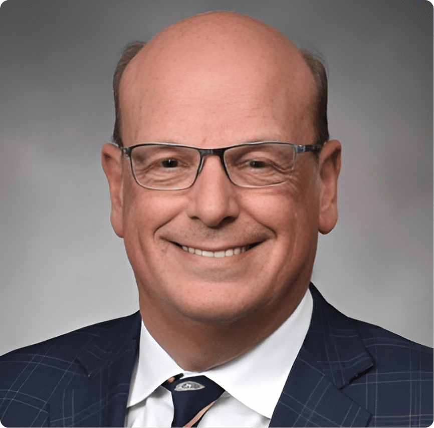 Smiling man in glasses and suit