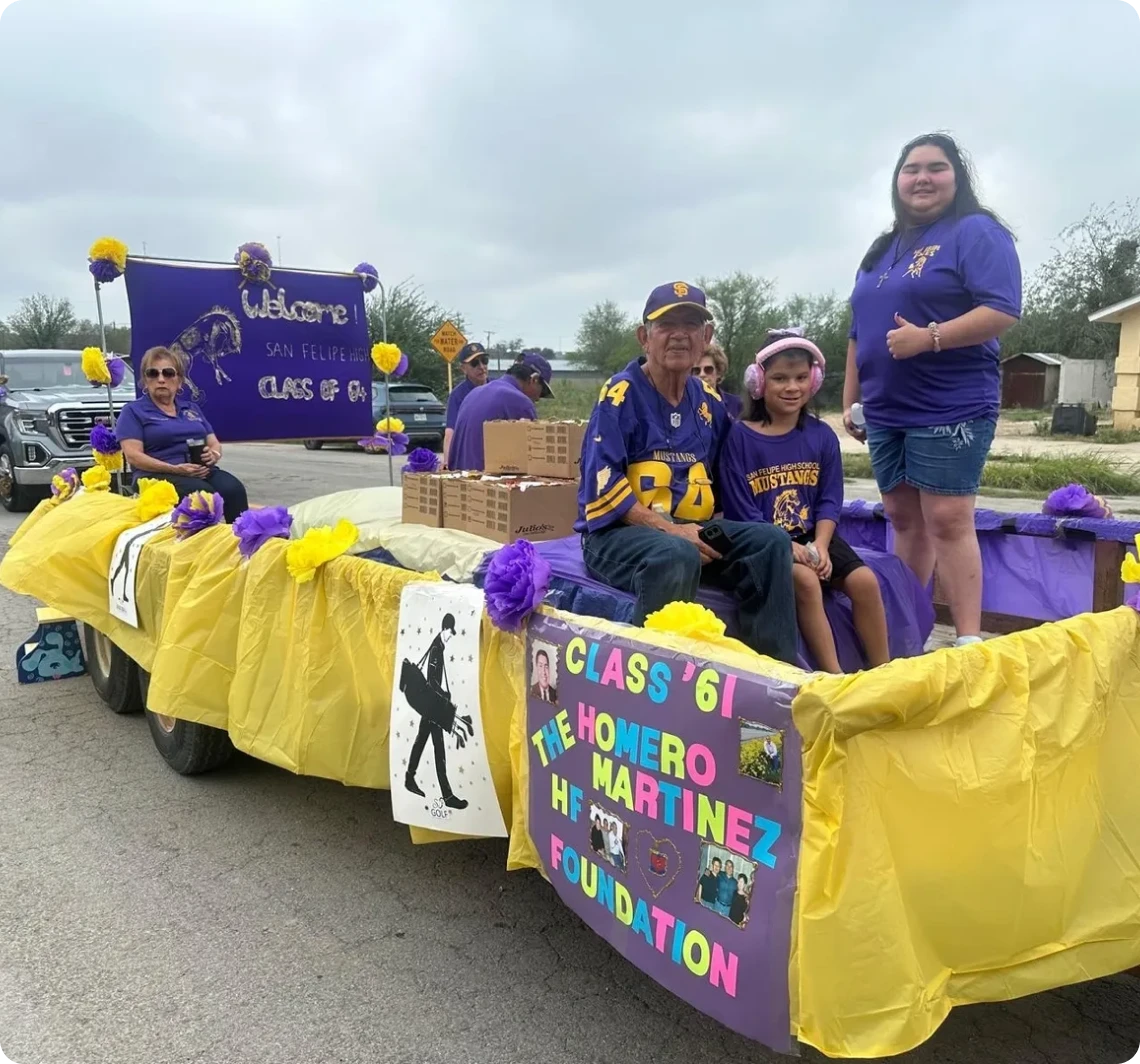 Family on decorated float in local parade